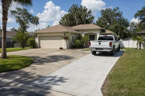 Driveway with a newly poured widening strip along one side